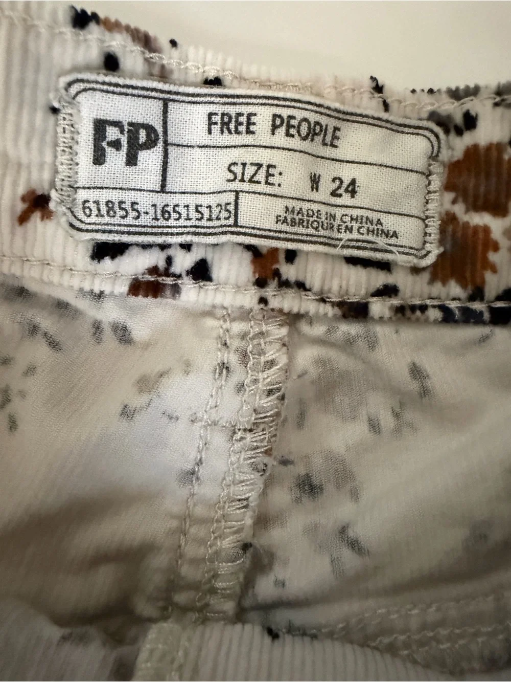 Free People White Floral Jean Shorts with Brown & Black Print